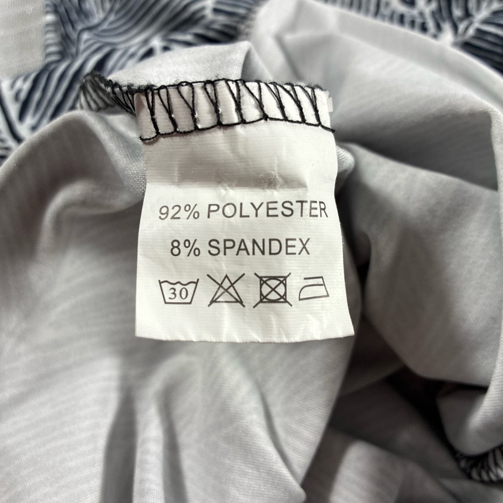 Arolina Small Flared Palazzo Resort Wear in black and white with a palm pattern - Picture 7 of 7